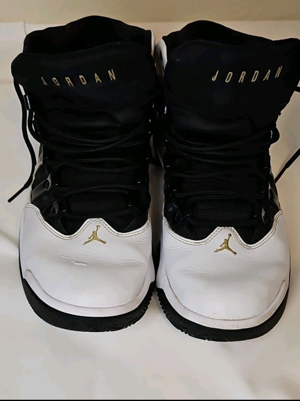 Jordan White Sneakers with Gold Jumpman Accent